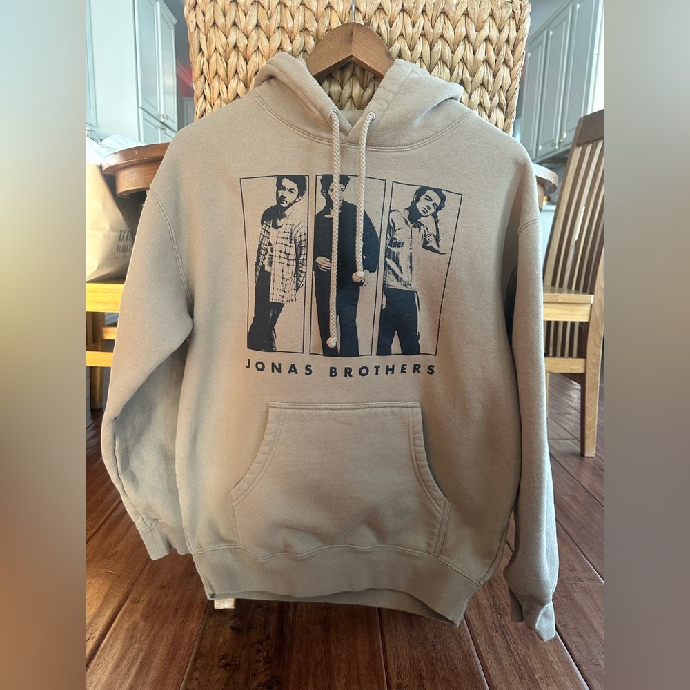 Jonas Brothers 2023 concert hoodie, tan, size M.